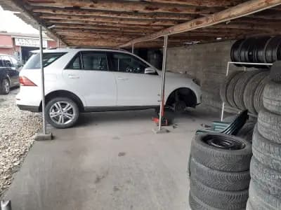 Център за гуми IMOLA