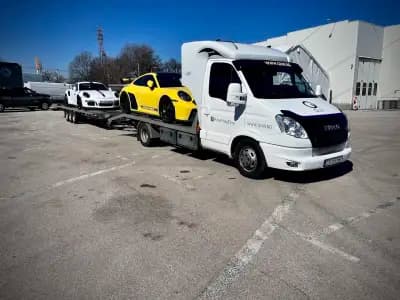 QUIX LTD І Внос на луксозни автомобили І Закрит транспорт на автомобили Европа І Пътна помощ Европа І SOS услуги