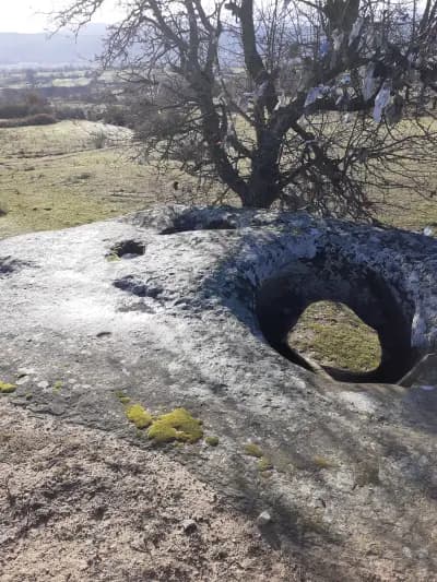 Дупчен камък