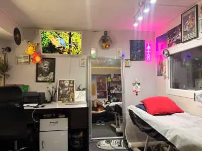 Snake Art Tattoo Studio