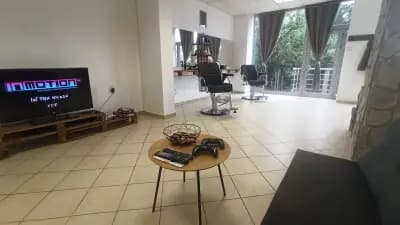 The Men's Cave Barbershop