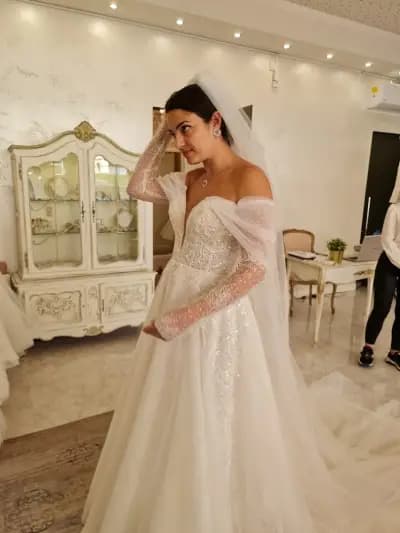 Carrie Bridal Boutique | Сватбени, булчински и официални рокли