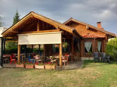 Пицария "Дървената къща"